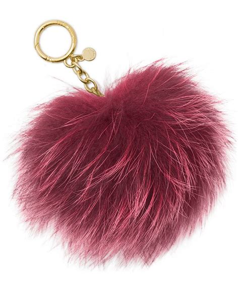 pompon michael kors|Pom.